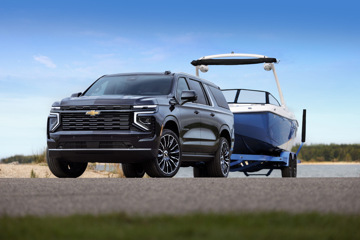 2025 Chevrolet Suburban towing a boat