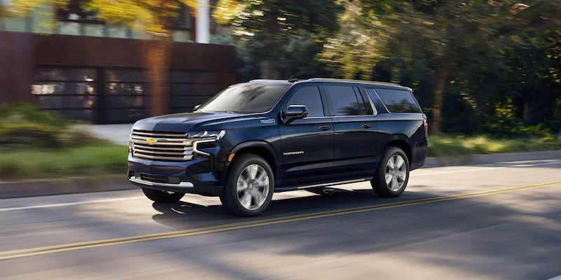 Black 2021 Chevy Suburban in urban area